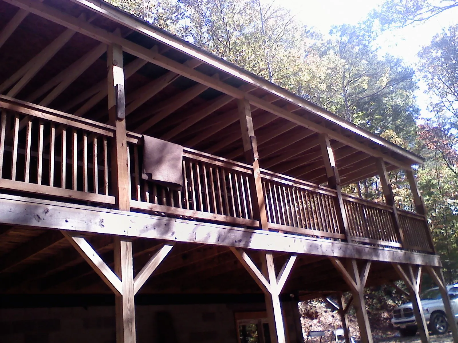 Timber framing under a new elevated porch and deck — Roof Leak Repair in Kearney by Roofing Brothers